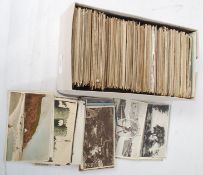 Vintage postcards in white shoe box. Wide range subjects/views. 700 items approx.