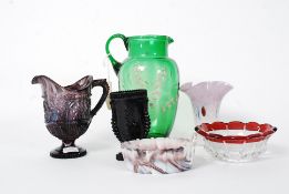 A collection of 19th and 20th century glasswares to include Mary Gregory style jug and others etc