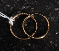 A pair of ladies 9ct gold  small round hoop earrings 0.