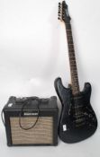 A Rocket Tone stratocaster shaped electric guitar, with humbucker pickups to the scratchplate,