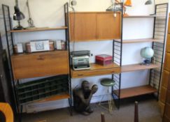 A good large 3 section ladderax system in teak complete with sectioned shelves,