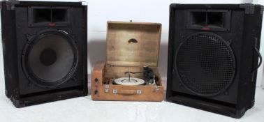 A pair of retro 20th century KAM speakers together with a vintage record player (af).