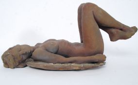 AWLSON, WALTER; ' Fallen Angel ' slip cast ceramic figure of a nude, with legs cradled.