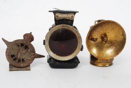 A vintage car badge for the Civil Service Motoring Association together with a vintage American