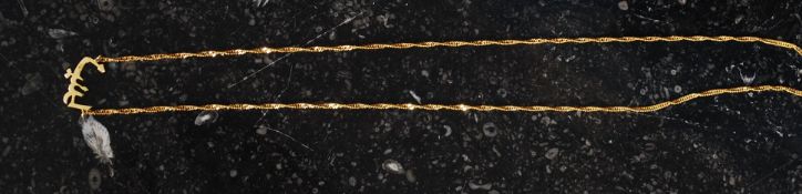 An 18ct gold Arabic pendant and necklace purchased originally in Saudi Arabia by the vendor,