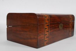 A good 19th century dome top tunbridge inlaid mahogany writing slope having appointed interior with