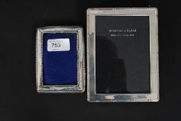 A silver hallmarked photo frame bearing marks for Birmingham 1939 by Garrard & Co together with a