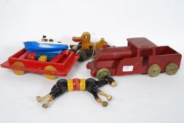 A collection of vintage childrens wooden toys to include a train by Betty Bashell,