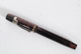 A vintage Parker ' Clipper ' MT & Co fountain pen with a 14ct gold nib.