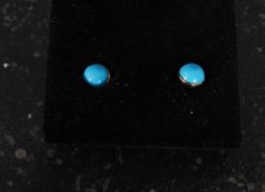 A 9ct gold ladies pair of earrings having fabulous turquoise inset stones. Measures: 1.