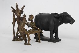 A pair of decorative 20th century miniature bronze shanti tribal African figurines of warriors