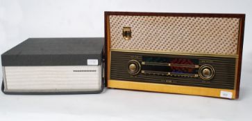 A vintage reel to reel player complete in the original case
