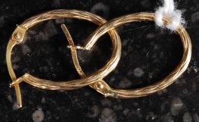 A pair of 9ct gold swirl hoop drop earrings, weight 1.
