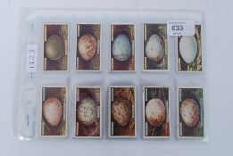 CIGARETTE CARDS; A complete set of vintage 1923 issued Ogdens Bird Eggs Cigarette cards.
