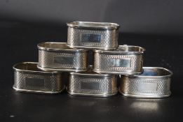 A set of 6 silver hallmarked Broadway & Co - Birmingham 1977 napkin rings of lozenge shape being