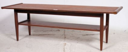 2 vintage retro 1970's coffee tables being raised on tapered supports to each