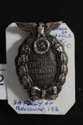 A German WW2 Third Reich Army SA Rally badge from Brunswick 1931 bearing notation  SA - Treffen