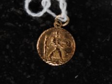 A 9ct gold small St Christopher  necklace pendant, weight 1.
