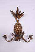 A 20th century vintage antique style gilt metal wall sconce in the form of a pineapple.