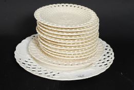 A collection of 20th century ribbon plates being stamped to the rear with a central shield and