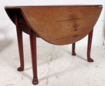 A 19th century  Georgian mahogany pad foot drop leaf table.
