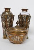 A pair of Cairo ware brass inlaid vases being inlaid with silver and copper