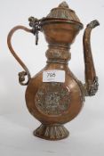 An Islamic Turkish coffee pot with silver inlaid detailing.