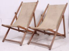 Two Vintage folding wooden deck chair and original material matching.