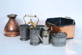 A collection of vintage pewter and brass wares.