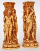 A decorative pair of asiatic erotic vases of cylindrical form with erotic nude women adorned to the