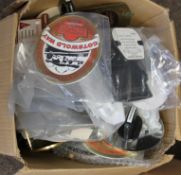 A large collection of 70+ vintage brass and plastic pub advertising beer pump labels.