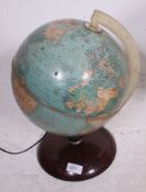 A vintage Rico Made In Italy revolving globe. Makers name to underside, standing on a moulded base.