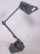 A heavy industrial anglepoise lamp with rectangular shade on strong arm with original grey painted