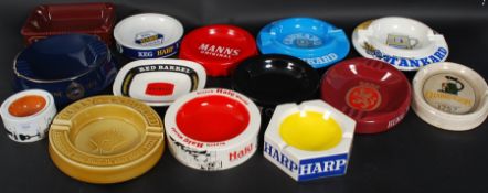 A collection of 14x pub ashtrays to include Harp, Haig, Tankard and many others, some vintage.