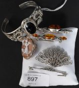 JEWELLERY: A 925 white metal Chinese oriental brooch, cameo brooch, amber brooches,