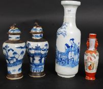 A pair of Chinese 19th century salt glazed urns together with another Chinese blue and white case