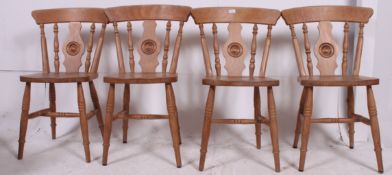 A set of 4 Victorian style pine Windsor kitchen dining chairs.
