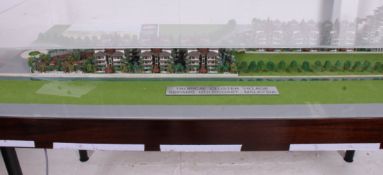 A table top architectural / architects model display of a Malaysian chalet set within an acrylic