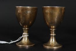 A pair of silver hallmarked duck egg / goose egg cups bearing hallmarks for Marson & Jones of