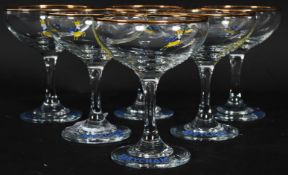 A set of six retro advertising promotional display glasses for Babycham,