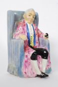 A Royal Doulton figurine of a seated gent entitled Derby - Model HN2024