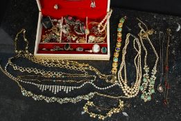 A good assortment costume jewellery to include rings, necklaces,