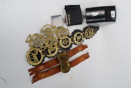 A mixed lot to include vintage horse brasses,