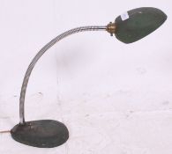 A 1930's cast metal anglepoise Industrial desk lamp in the original green finish with flicker