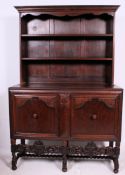 A 1930's carved oak welsh dresser.