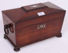 A 19th century Rosewood and mother of pearl inlaid sarcophagus shaped tea caddy having lined