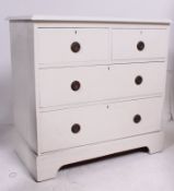 An Edwardian shabby chic painted cottage 2 over 2 chest of drawers.