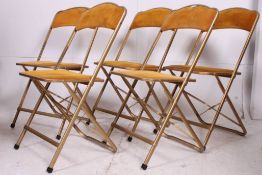 A set of five stunning French gilt metal folding chairs having gold velour pads and rests.