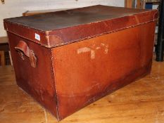 A 20th century leather cased trunk with lift off top having handles to the sides ( see