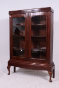 A good early 20th century large bookcase cabinet on stand.